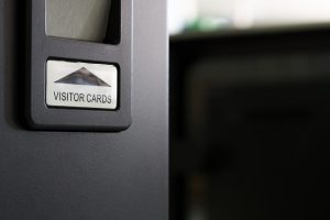 Visitor cards return slot